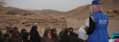 HERAT, WESTERN AFGHANISTAN, An IOM staff provides hygiene awareness to an earthquake-affected community in Herat.