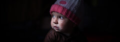 HERAT, WESTERN AFGHANISTAN, Young Hasib, finds peace with his mother in a tent as humanitarian aid arrives, bringing hope after the Herat earthquakes devastated their home.