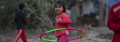 Myanmar, Internally displaced children play in an IDP camp in the town of Dimawhso in Kayah (Karenni) State.