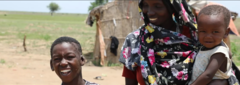 Sudan, Nour with his mother and baby brother.