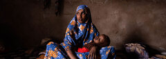 Puntland, Somalia, As a single mother, Hodan depends on the goodwill of others to support her and her family. Their livestock died during
previous droughts and her husband abandoned the family.