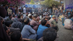 TORKHAM BORDER, EASTERN AFGHANISTAN, Migrants who have returned from Pakistan wait in the IOM Transit Center in Torkham to receive assistance.