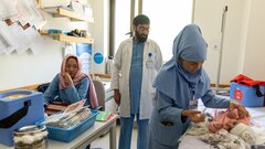 BAMYAN, CENTRAL AFGHANISTAN, A health-care professional medicates a baby in the new Bamyan Hospital built by the Aga Khan Agency for Habitat in Bamyan Province, Afghanistan.