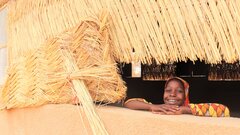 Tillabéri, Niger, This girl has been displaced from her home and is now attending an emergency school.