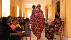 Port Sudan, Sudan, People gathering in the waiting area in IOM supported clinic in Port Sudan. The clinic provides free of charge essential health care services and medicines for displaced people and vulnerable families. It also offers referral system and supports with ambulances for emergencies in the displacement sites.  