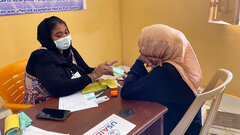 Port Sudan, A general practitioner provides consultation to a patient in a clinic supported in Port Sudan. 