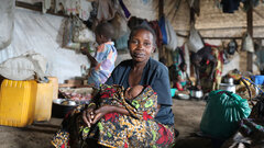 Bunia, Democratic Republic of the Congo , A woman and her baby at a camp in Bunia for displaced people who fled violence. 