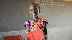 Mali, Aichata with her school supplies.  

 